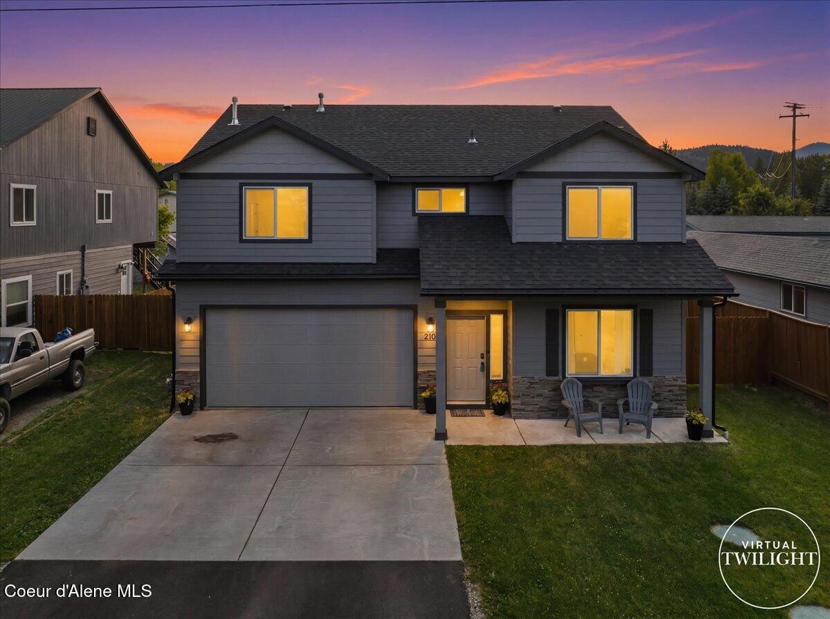 210 4th Street Dover, ID 83825 - Photo 2 of 70 02-Twilight Aerial Front of Home waterma