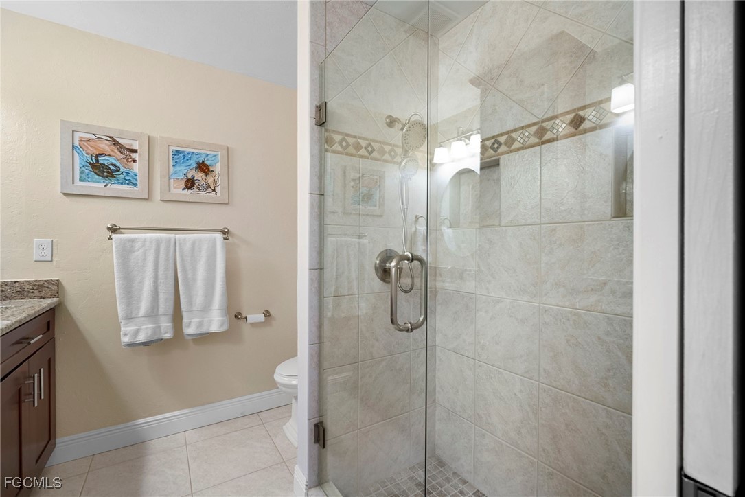 5688 Arvine Circle Fort Myers, FL 33919 - Photo 13 of 39 a bathroom with a shower