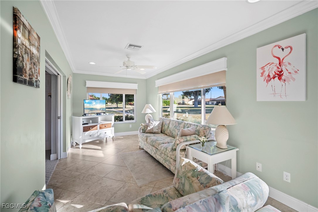 5688 Arvine Circle Fort Myers, FL 33919 - Photo 26 of 39 a living room with furniture and a painting