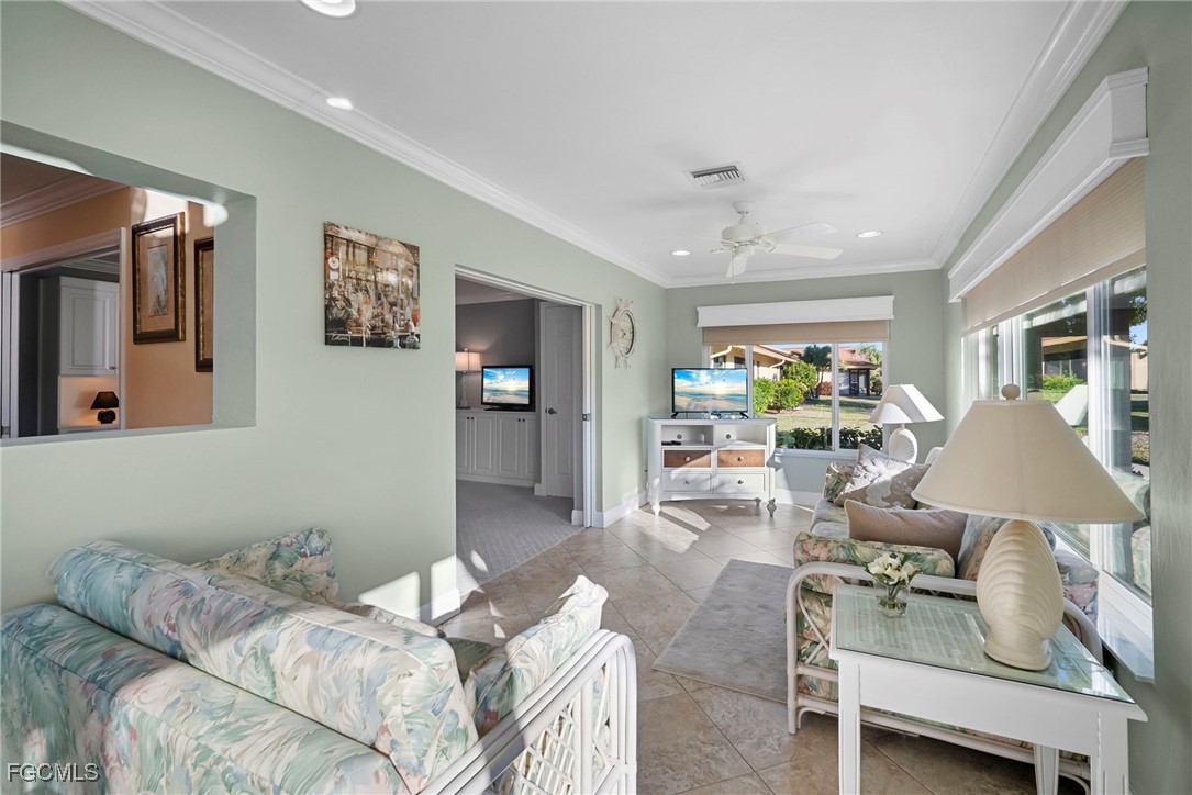 5688 Arvine Circle Fort Myers, FL 33919 - Photo 28 of 39 a bedroom with furniture and a wooden floor