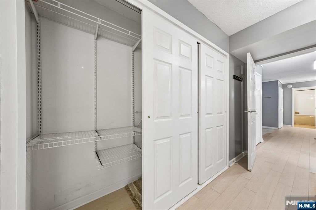 326 Prospect Avenue, Unit 10H Hackensack, NJ 07601 - Photo 14 of 31 a view of a walk in closet