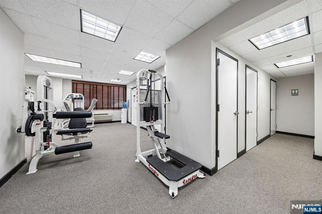 326 Prospect Avenue, Unit 10H Hackensack, NJ 07601 - Photo 21 of 31 a view of a room with gym equipment