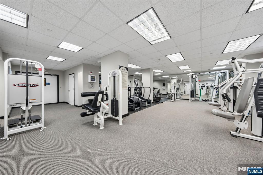 326 Prospect Avenue, Unit 10H Hackensack, NJ 07601 - Photo 22 of 31 a view of a room with gym equipment