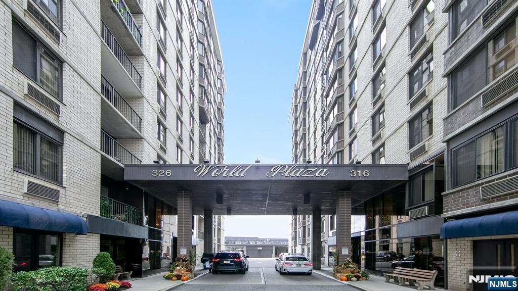 326 Prospect Avenue, Unit 10H Hackensack, NJ 07601 - Photo 31 of 31 a view of a building with car parked