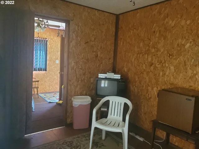 a view of a lake with a house in the background