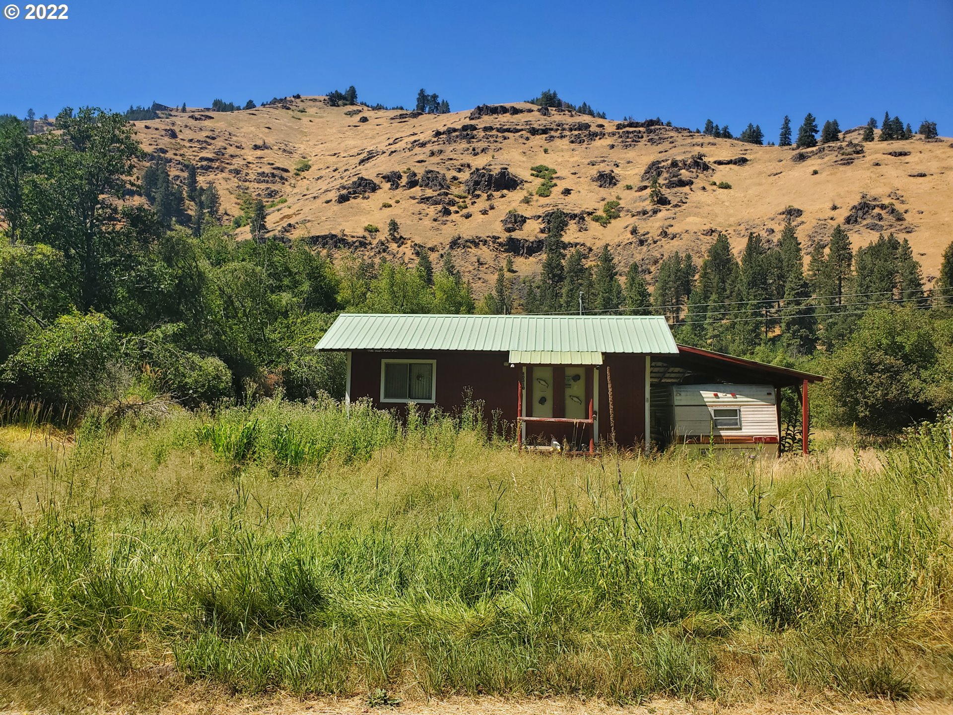 60310 Elk Way Imnaha, OR 97842 - Photo 8 of 19 a view of a house with a yard