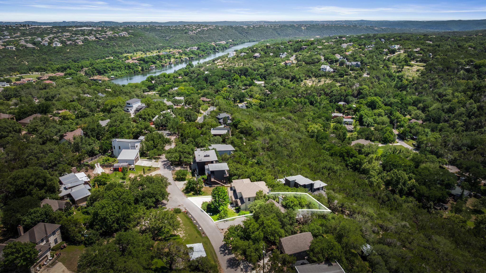 14213 Red Feather Trail Austin, TX 78734 - Photo 36 of 39 an aerial view of a house with a yard