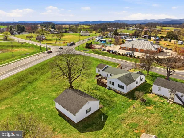 a view of an aerial view of residential houses with outdoor space