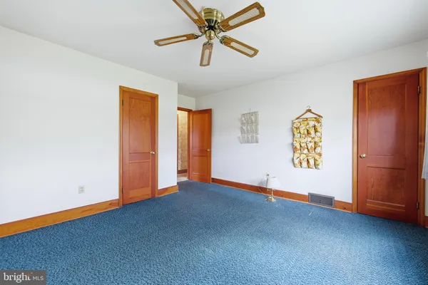 a view of store room with table and chairs