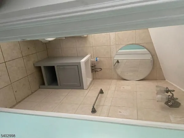 a bathroom with a toilet and a sink