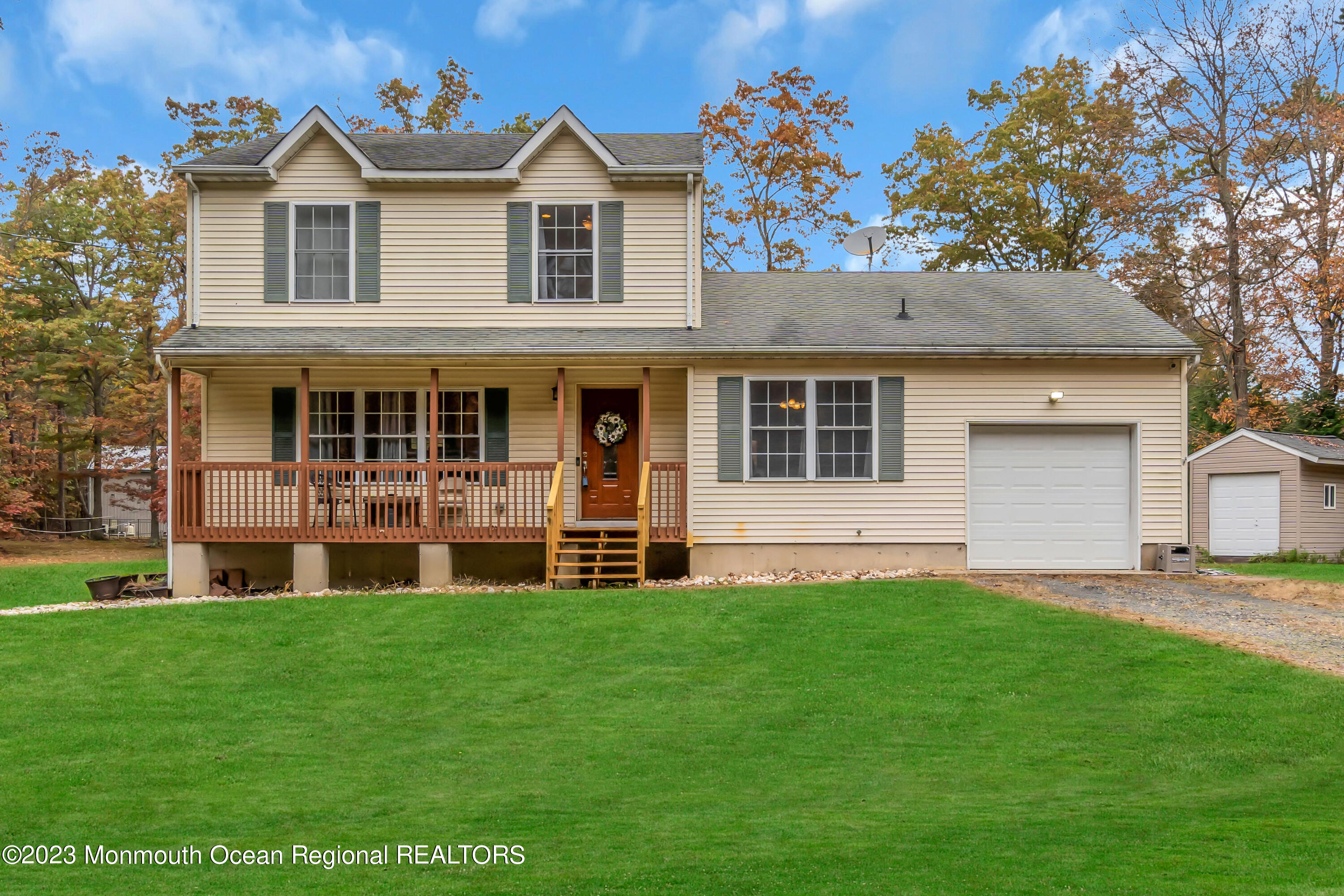 497 Leesville Road Jackson, NJ 08527 - Photo 1 of 25 a front view of a house with a yard