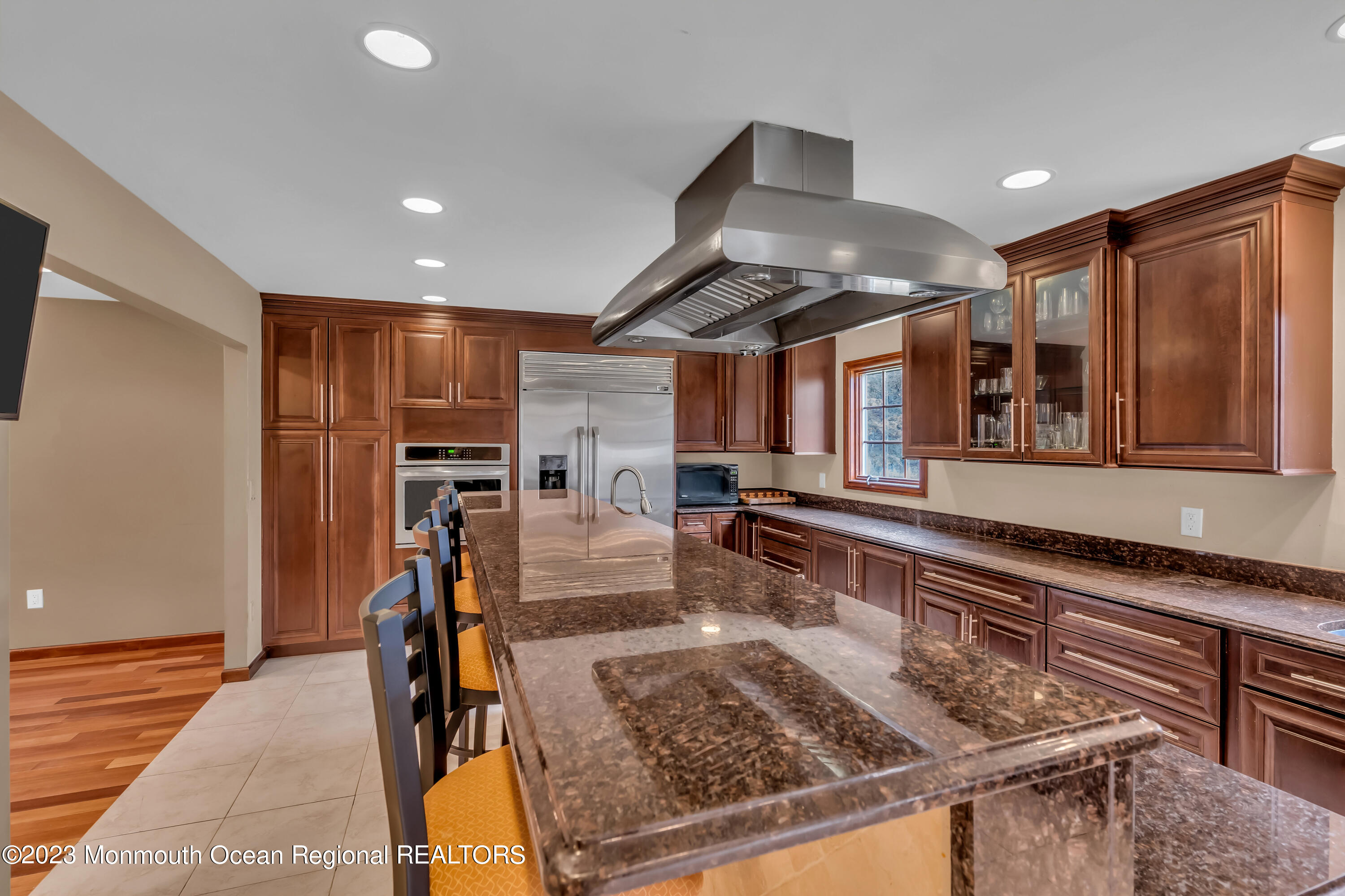 497 Leesville Road Jackson, NJ 08527 - Photo 15 of 25 a kitchen with stainless steel appliances granite countertop a stove and a refrigerator