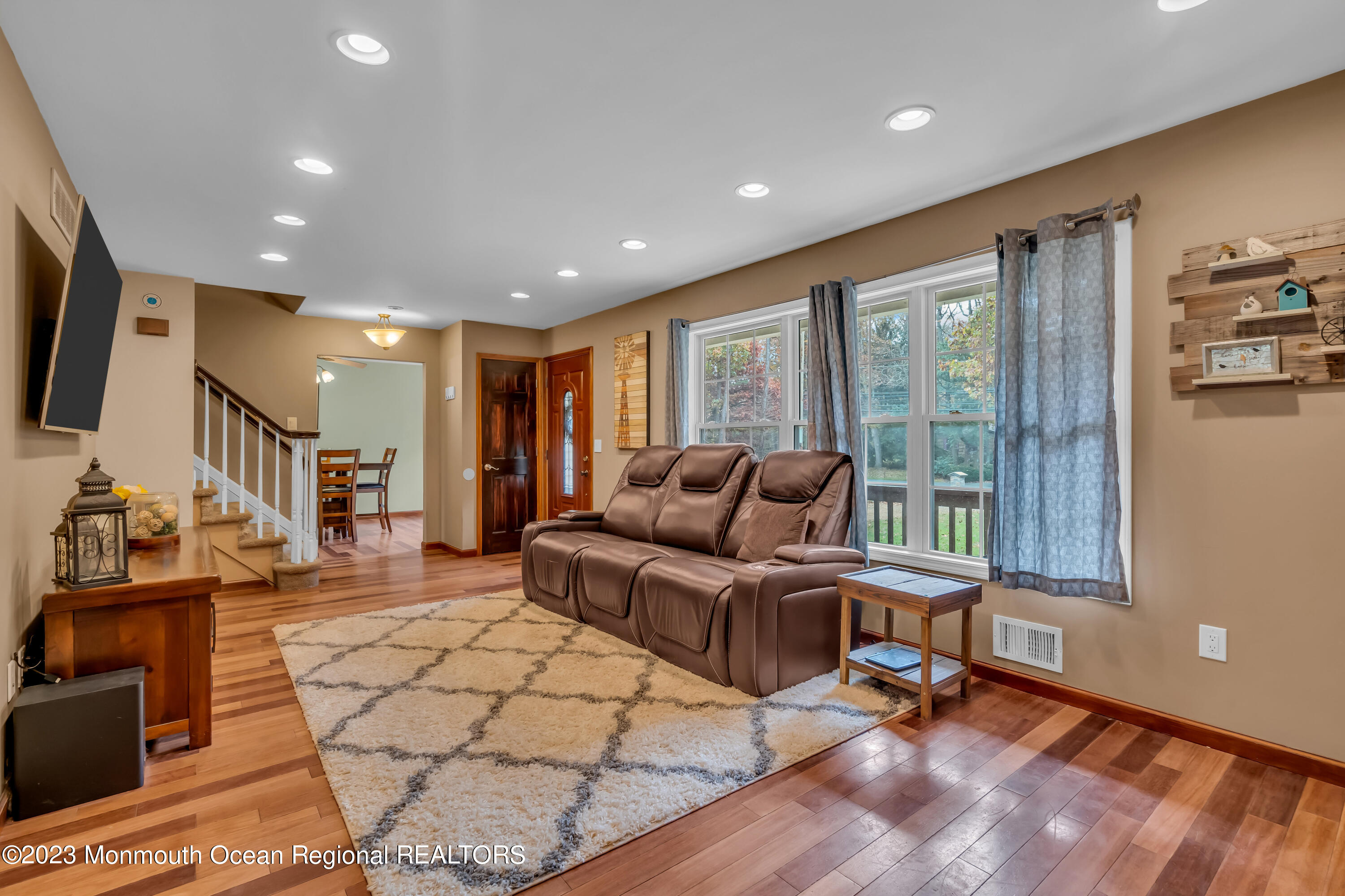 497 Leesville Road Jackson, NJ 08527 - Photo 6 of 25 a living room with furniture and a flat screen tv