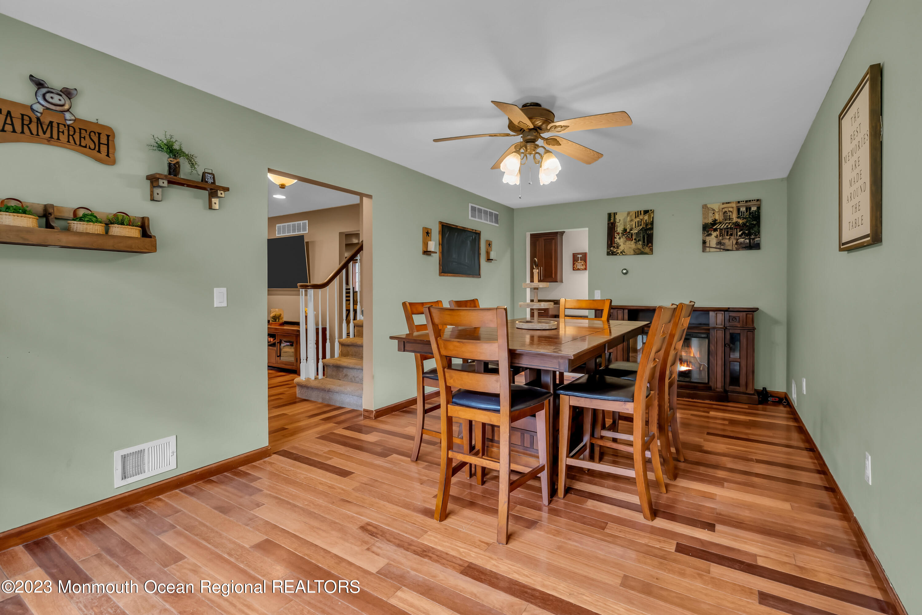 497 Leesville Road Jackson, NJ 08527 - Photo 8 of 25 a view of a dining room with furniture and wooden floor
