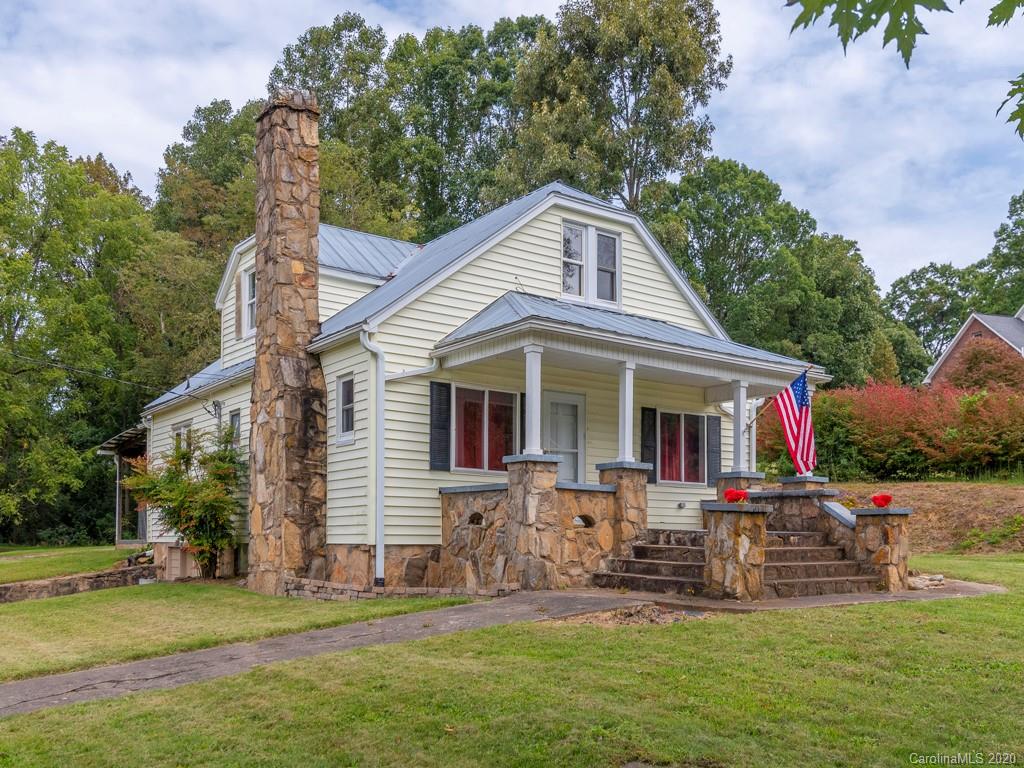 793 Morning Star Road Canton, NC 28716 - Photo 1 of 24 a front view of house with yard outdoor seating and green space