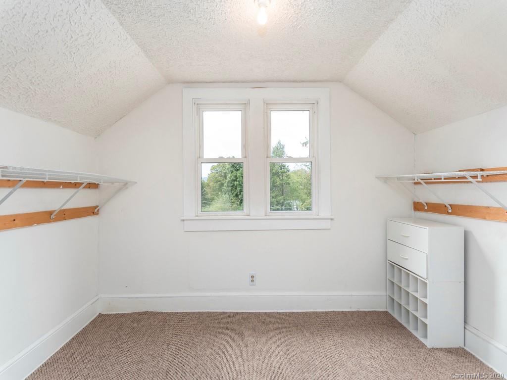 793 Morning Star Road Canton, NC 28716 - Photo 17 of 24 an empty room with a window