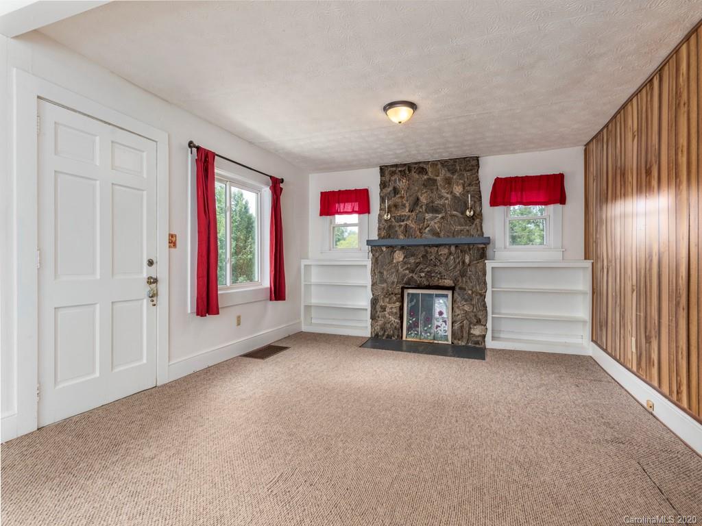 793 Morning Star Road Canton, NC 28716 - Photo 4 of 24 a view of a livingroom with a fireplace
