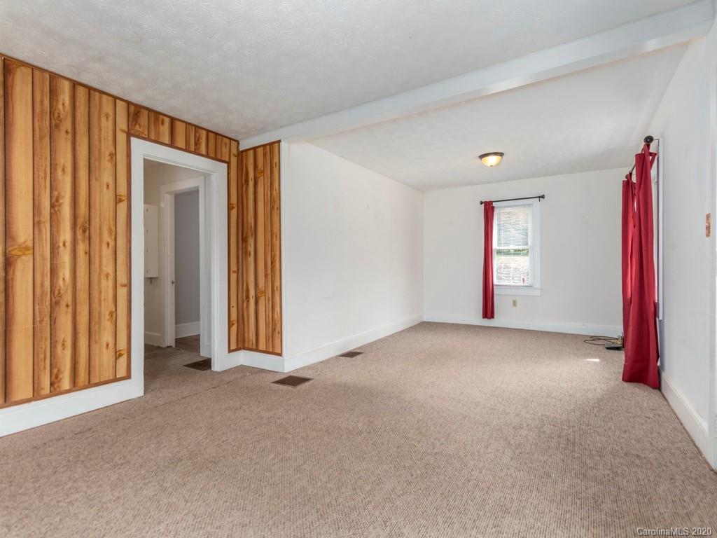 793 Morning Star Road Canton, NC 28716 - Photo 5 of 24 a view of empty room with windows
