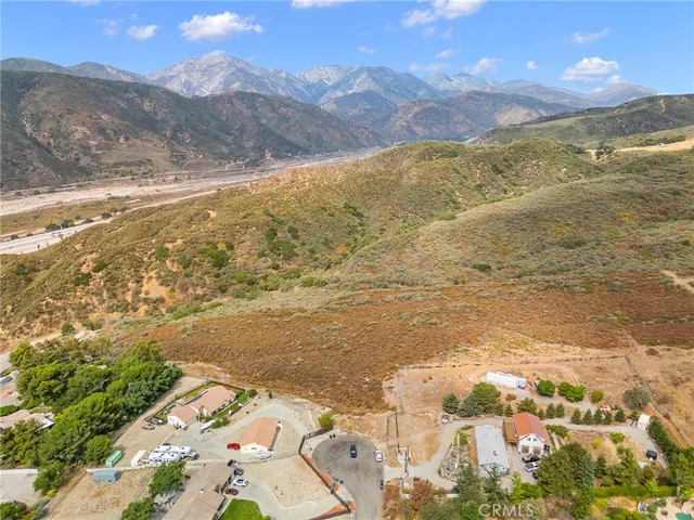 a view of ocean and mountains
