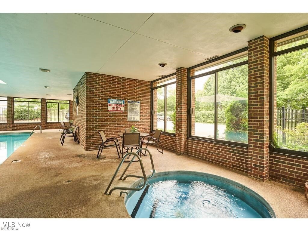 2365 Covington Road, Unit 225 Akron, OH 44313 - Photo 24 of 36 View of pool featuring an indoor hot tub