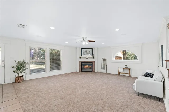 a view of livingroom with furniture and window