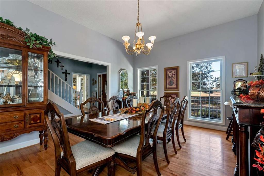 51 Howiington Road Jefferson, GA 30549 - Photo 11 of 81 a view of a dining room with furniture and wooden floor