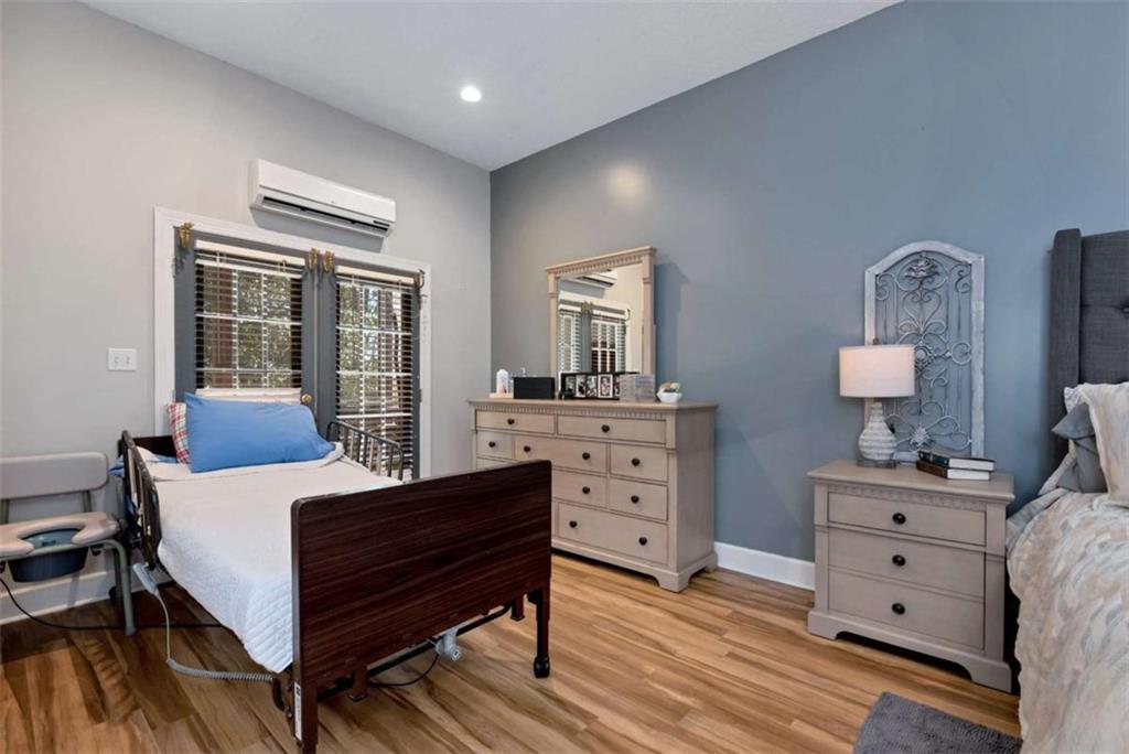 51 Howiington Road Jefferson, GA 30549 - Photo 20 of 81 a bedroom with a bed and a dresser