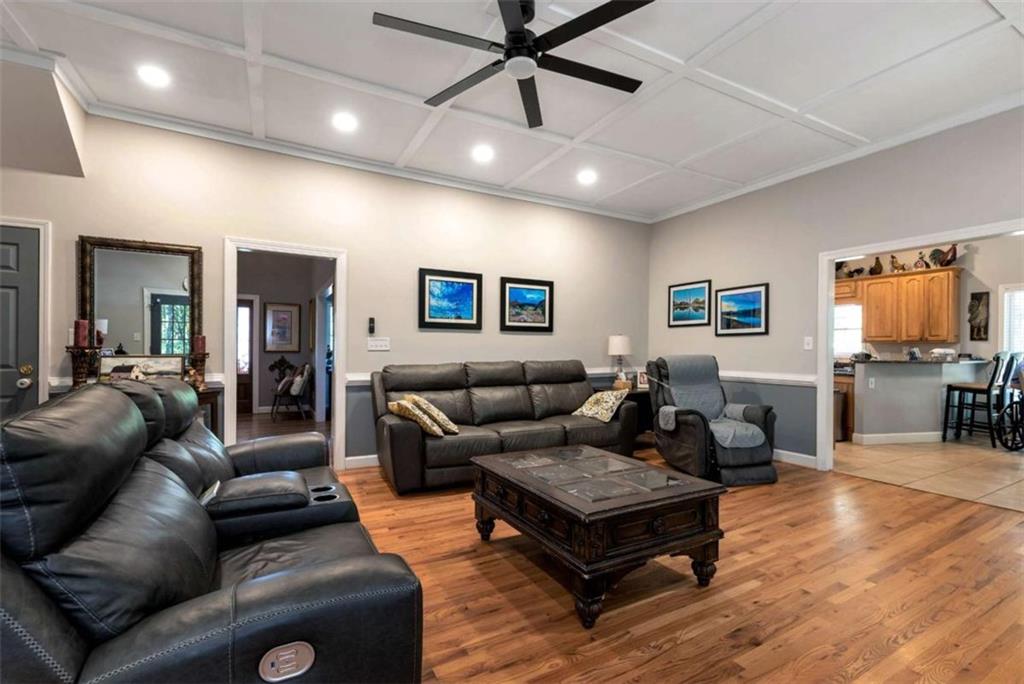 51 Howiington Road Jefferson, GA 30549 - Photo 28 of 81 a living room with furniture and wooden floor