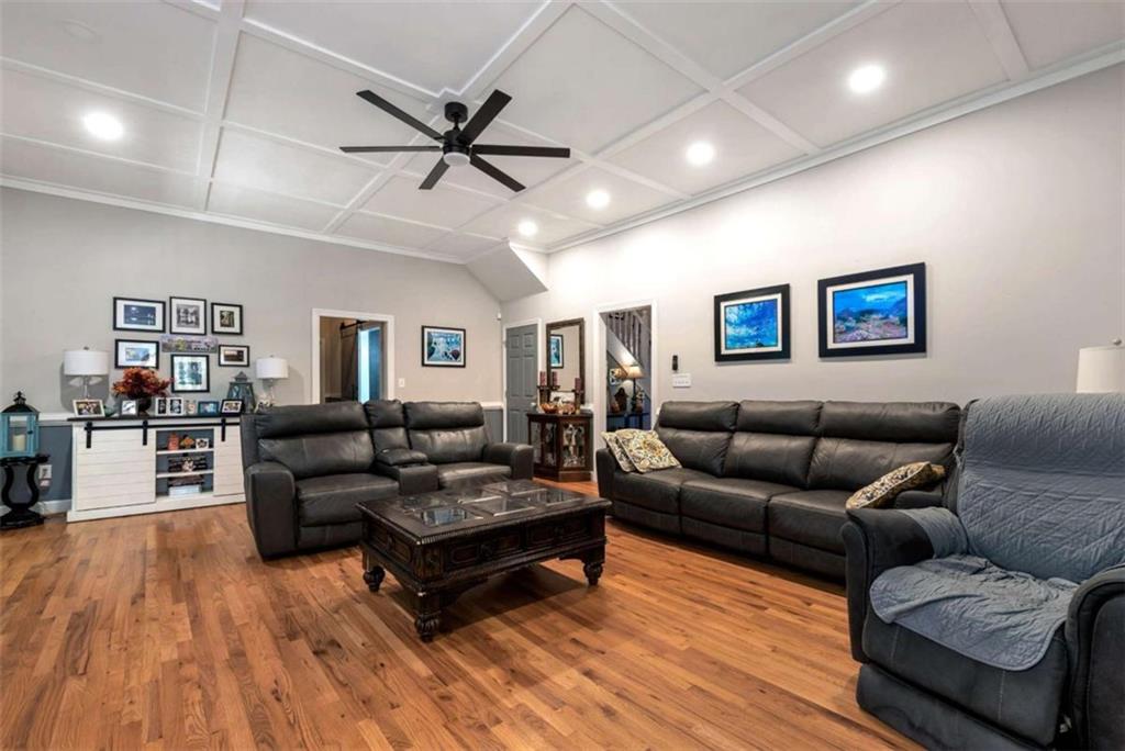 51 Howiington Road Jefferson, GA 30549 - Photo 29 of 81 a living room with furniture and wooden floor