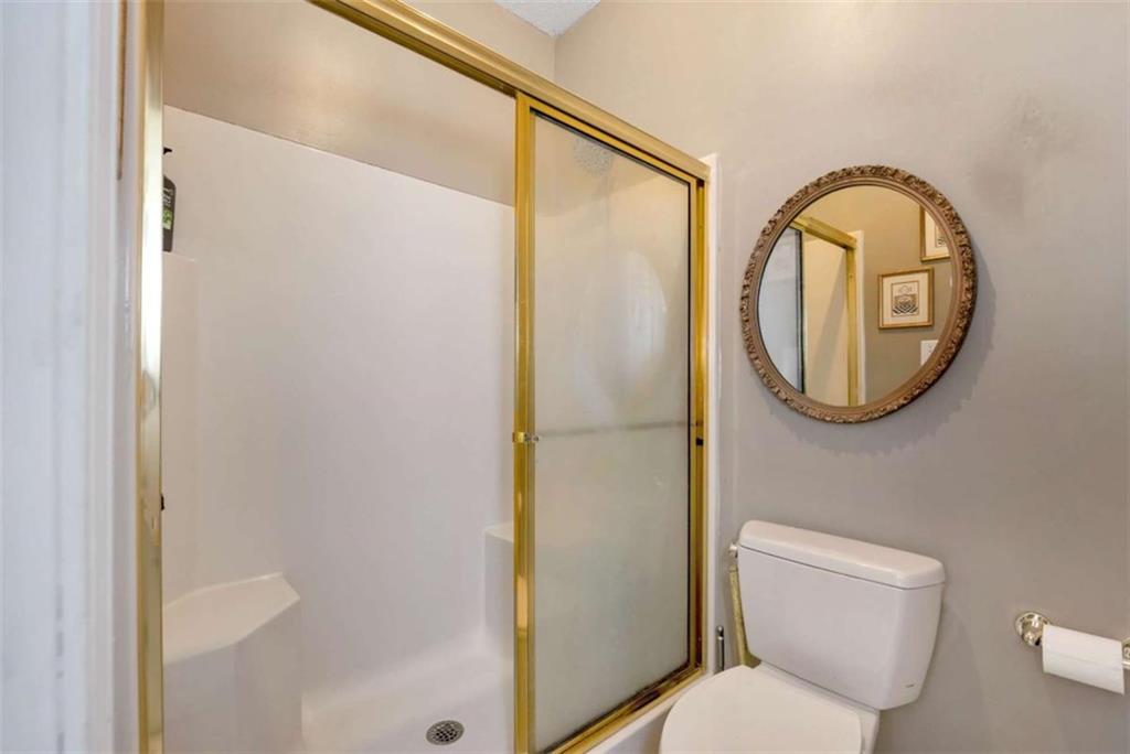 51 Howiington Road Jefferson, GA 30549 - Photo 37 of 81 a bathroom with a toilet and a mirror