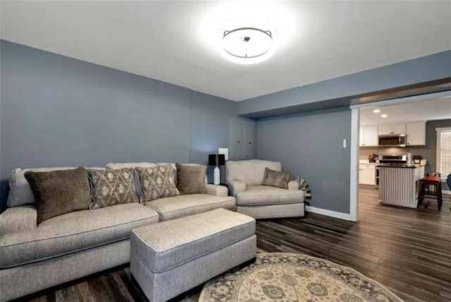 a view of balcony with chairs and wooden fence