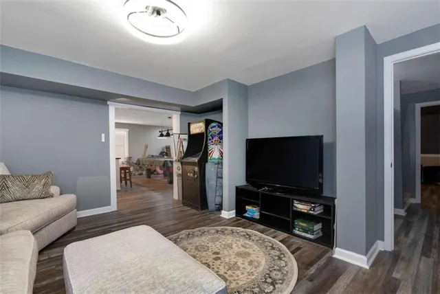 a backyard of a house with outdoor seating