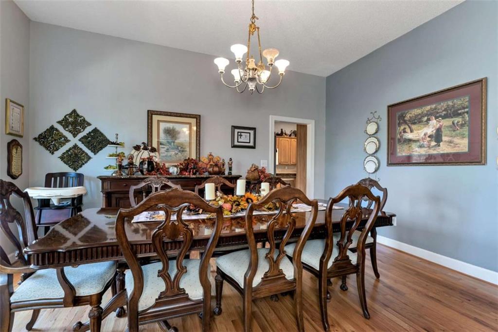 51 Howiington Road Jefferson, GA 30549 - Photo 8 of 81 a view of a dining room with furniture and wooden floor
