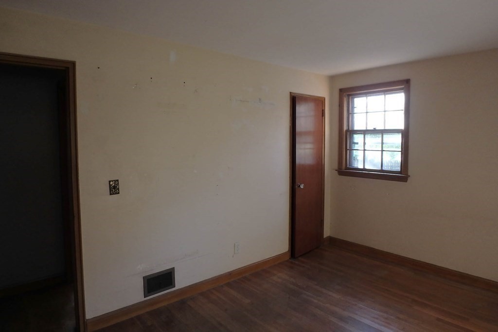 285 Andover Street Danvers, MA 01923 - Photo 12 of 20 an empty room with wooden floor and windows