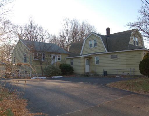 159 Berkeley Road Fairfield, CT 06825 - Photo 1 of 1 a view of a house with a yard