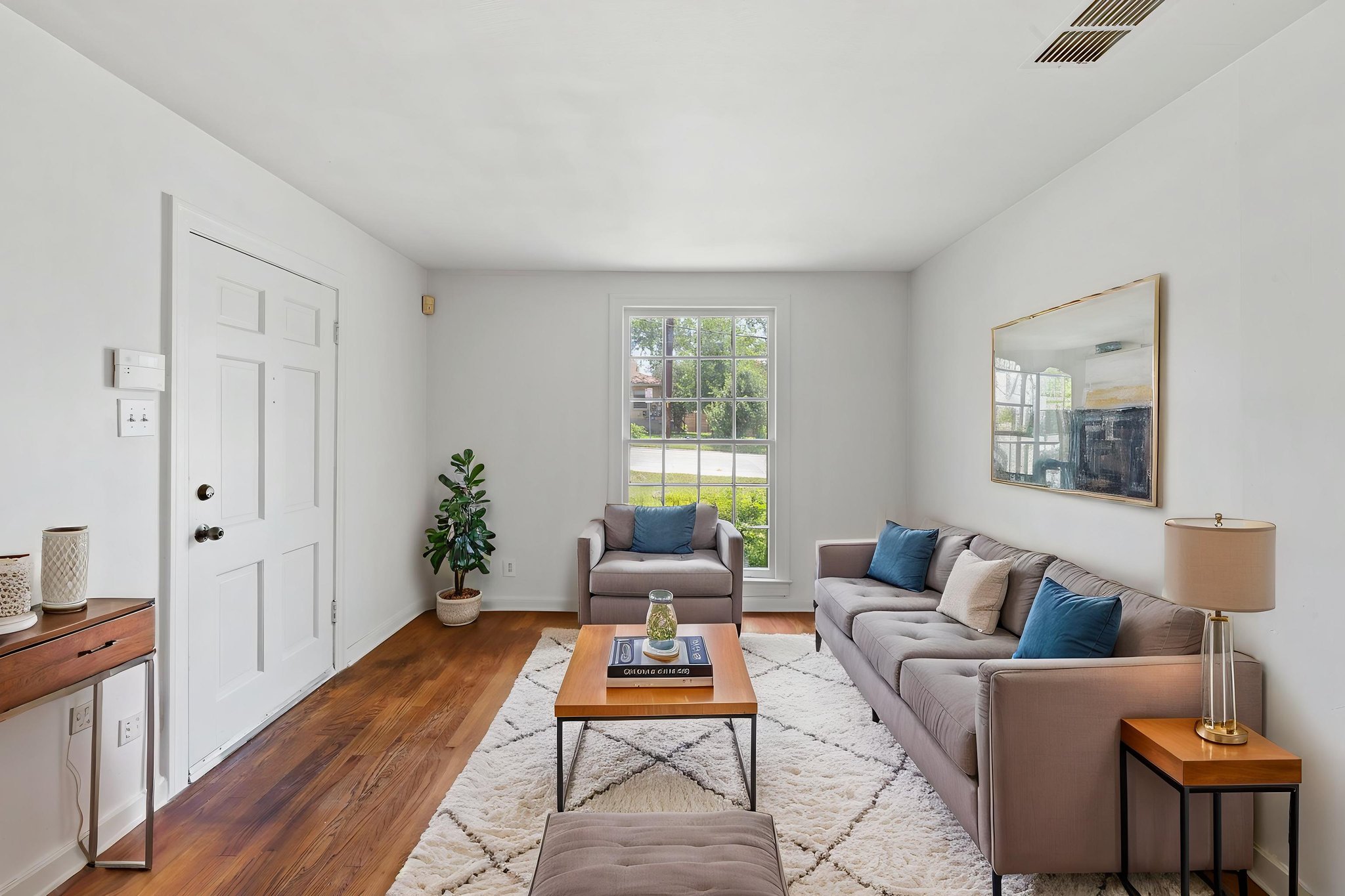3704 Cherrywood Road Austin, TX 78722 - Photo 8 of 40 Staged living room.