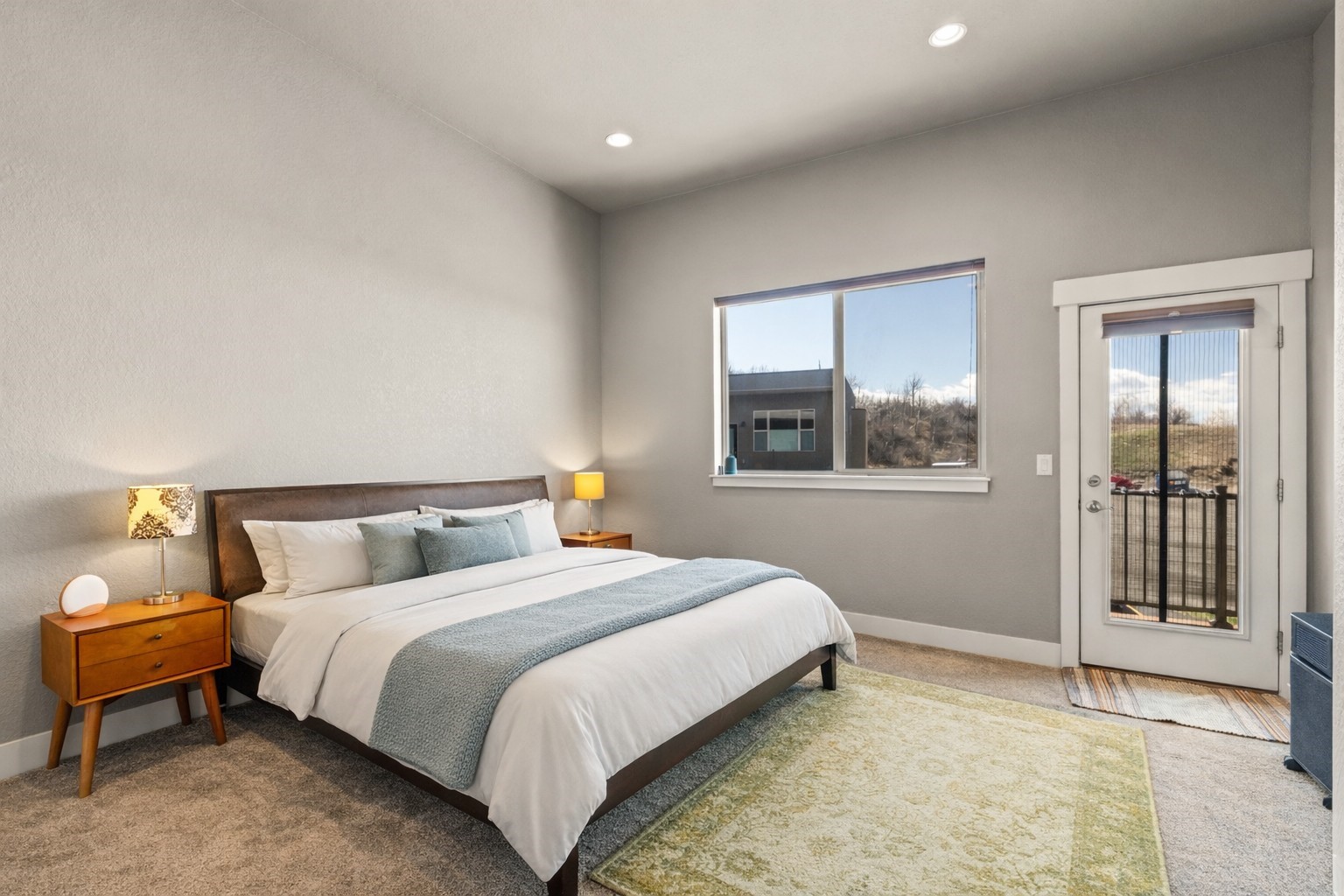 1680 Copper Ridge Drive, Unit 101 Steamboat Springs, CO 80487 - Photo 11 of 21 a bedroom with a bed and window