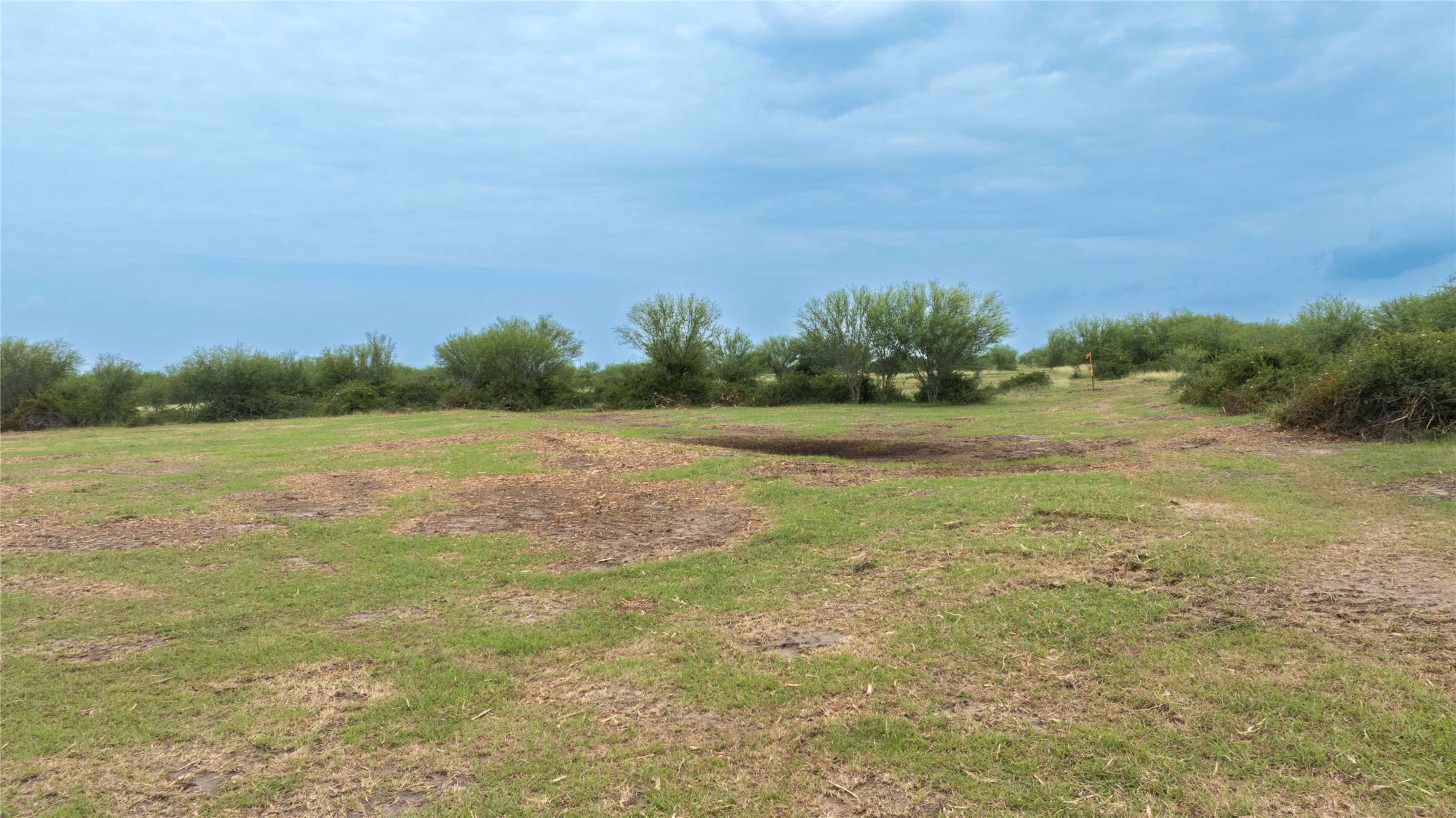 Lot 14 Concrete-Edgar Road Cuero, TX 77954 - Photo 11 of 12 a view of a field with an ocean