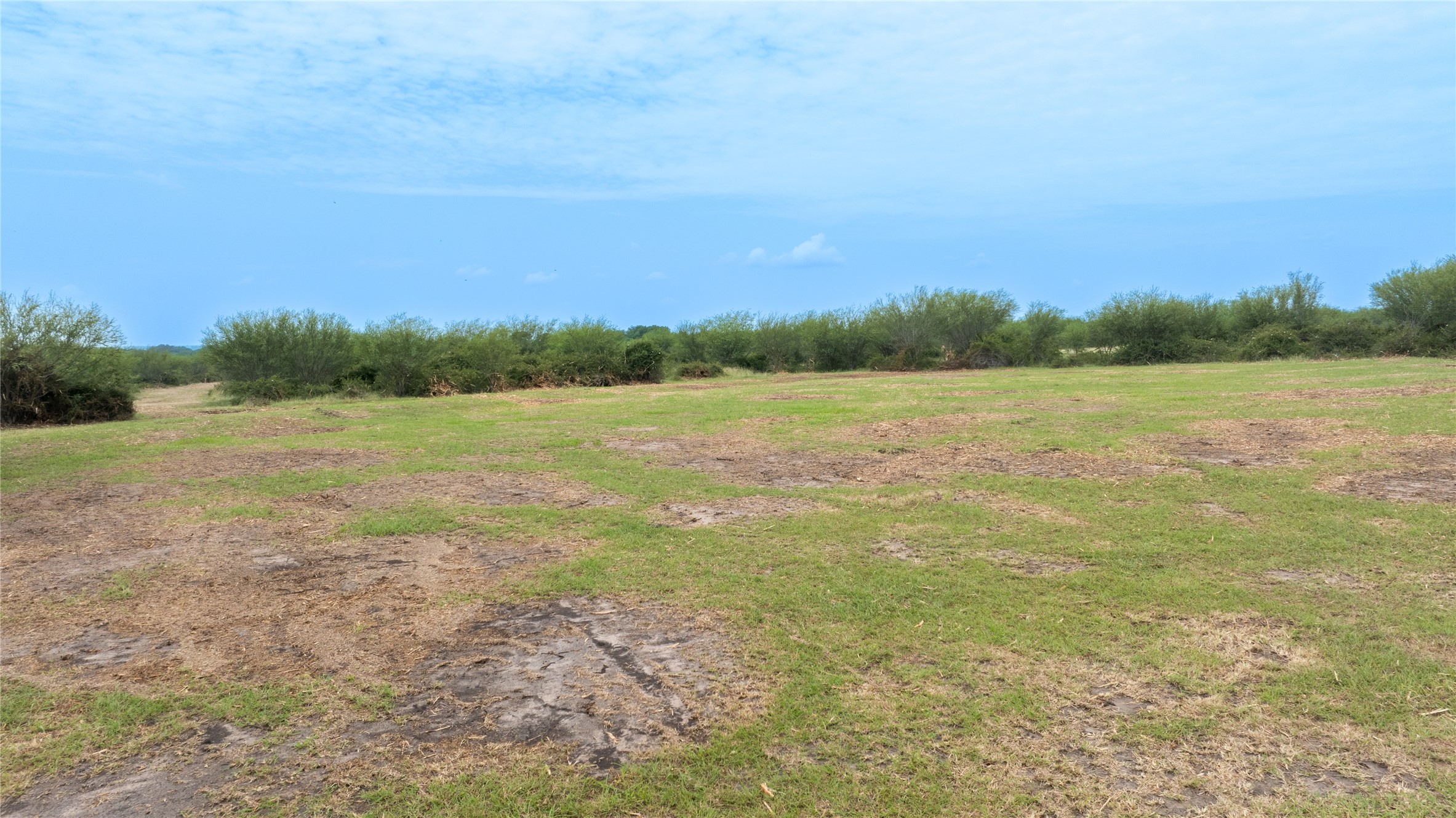 Lot 14 Concrete-Edgar Road Cuero, TX 77954 - Photo 10 of 12 a view of a field with an ocean