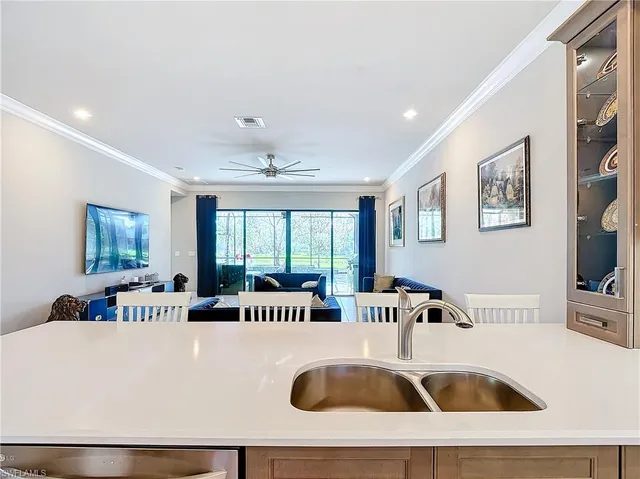 a living room with furniture and window