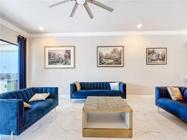 a living room with furniture and a couch