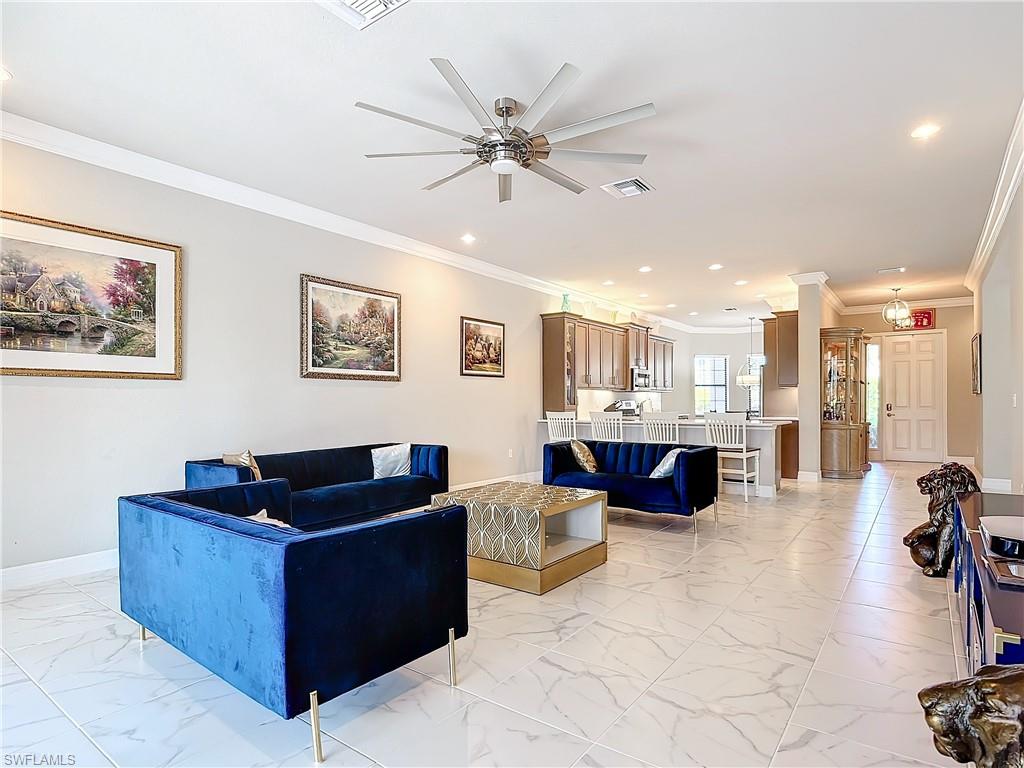 4310 Aurora Street Naples, FL 34119 - Photo 24 of 50 a living room with furniture and view of living room