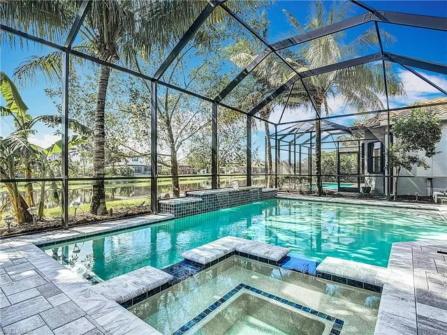a view of a two chairs in the patio