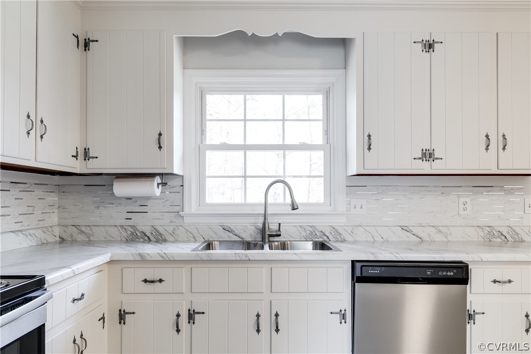 13007 Buckland Road Chester, VA 23831 - Photo 19 of 44 a kitchen with stainless steel appliances granite countertop white cabinets and a sink
