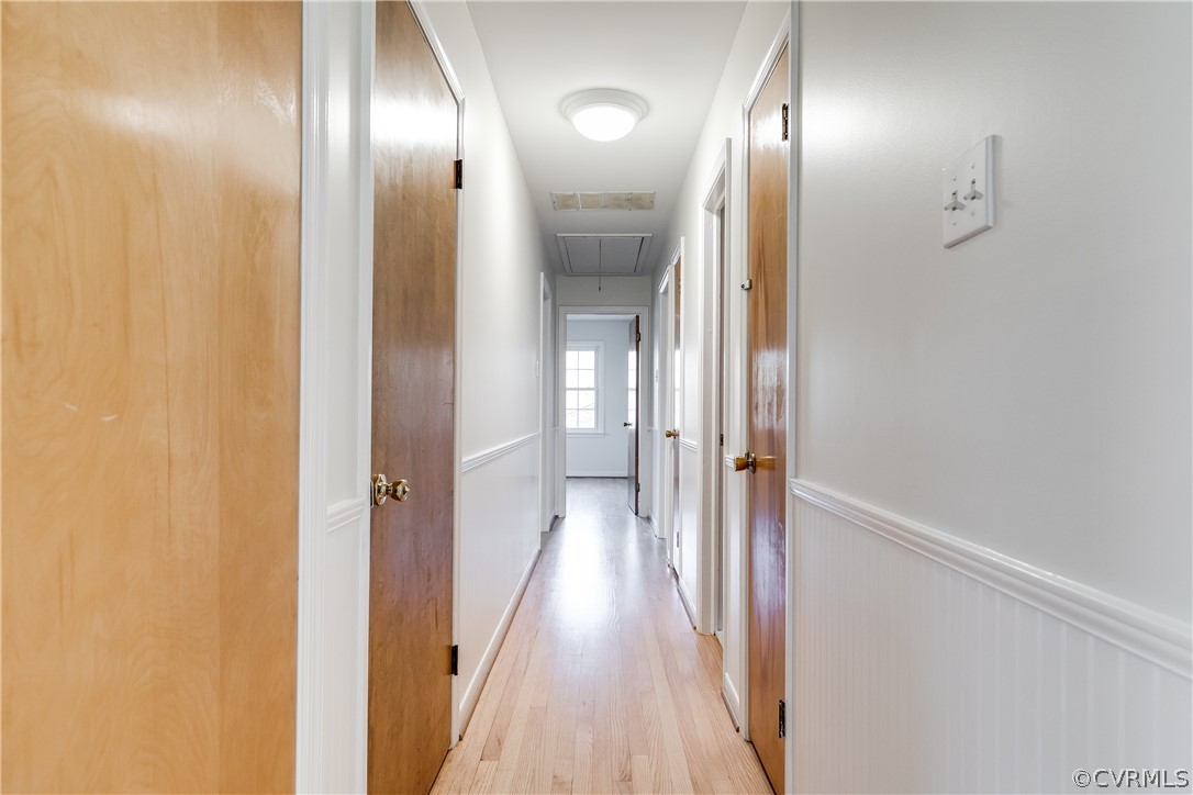 13007 Buckland Road Chester, VA 23831 - Photo 20 of 44 a view of a hallway with wooden floor