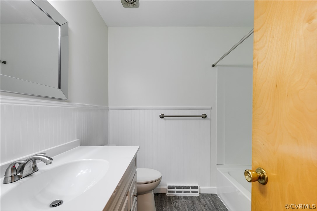 13007 Buckland Road Chester, VA 23831 - Photo 22 of 44 a bathroom with a sink and a toilet