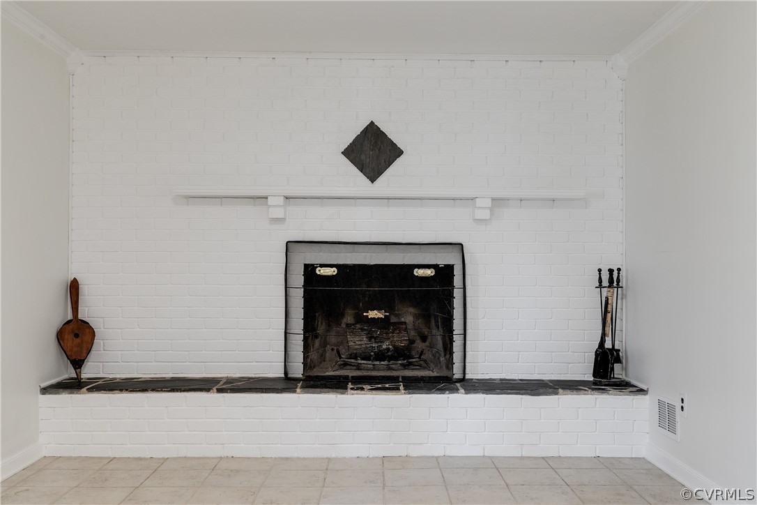 13007 Buckland Road Chester, VA 23831 - Photo 34 of 44 a living room with a fireplace and a rug