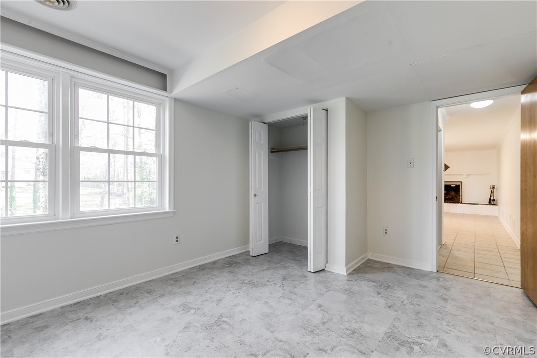 13007 Buckland Road Chester, VA 23831 - Photo 36 of 44 an empty room with windows and closet
