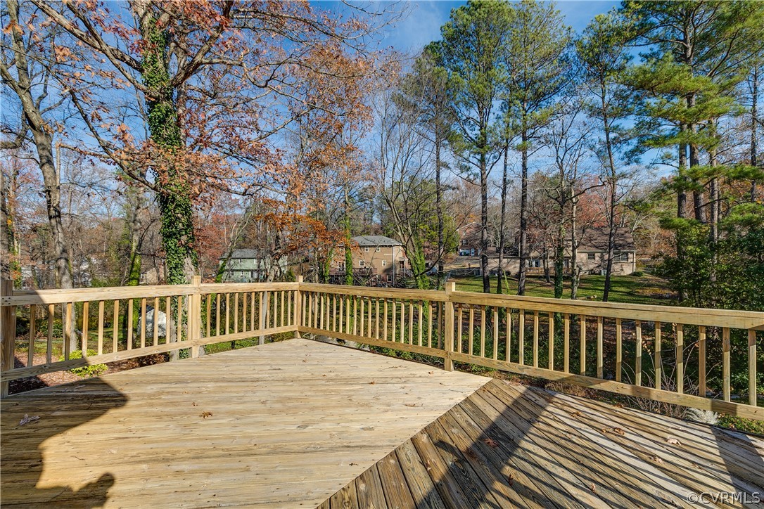 13007 Buckland Road Chester, VA 23831 - Photo 43 of 44 a view of balcony with wooden floor and fence