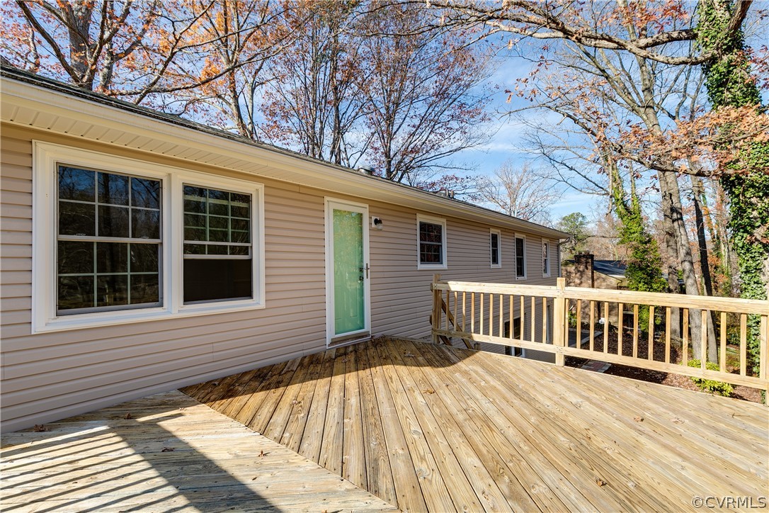 13007 Buckland Road Chester, VA 23831 - Photo 44 of 44 a view of a house with a wooden bench